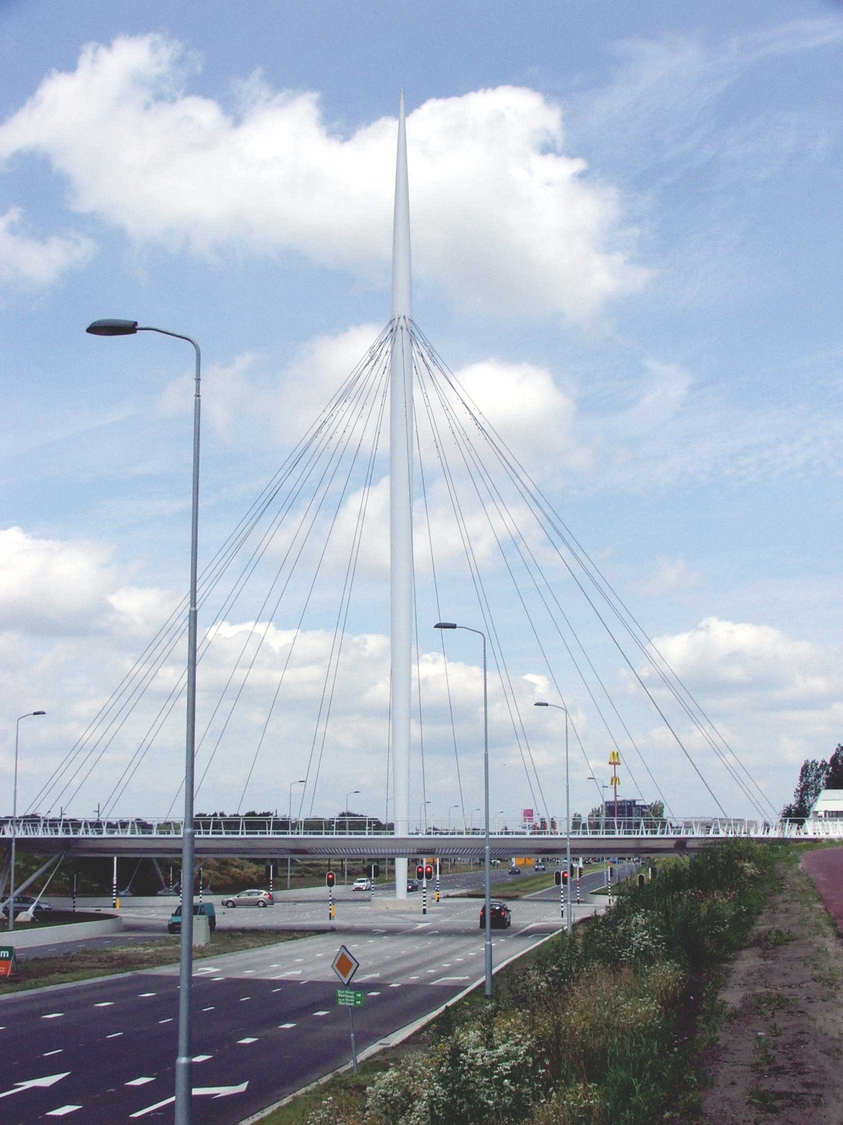 The Hovenring in Eindhoven — a suspended circular cycle bridge above a road junction.