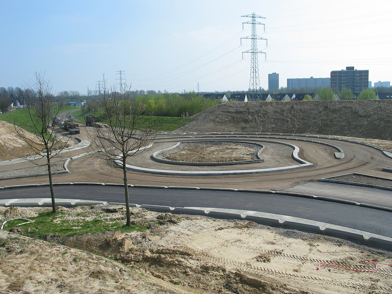 Turbo-roundabout under construction on the Euregioweg in Heerlen, with the spiral lane geometry clearly visible.